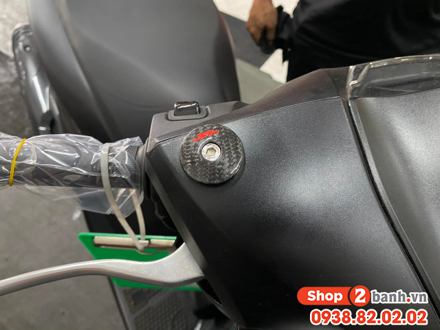 Nút che kính chân kính carbon - 7